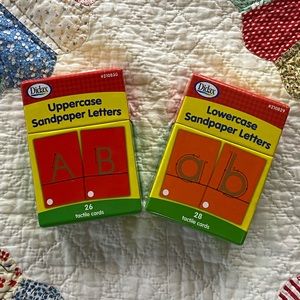 A set of both Uppercase & Lowercase Sandpaper Letters.